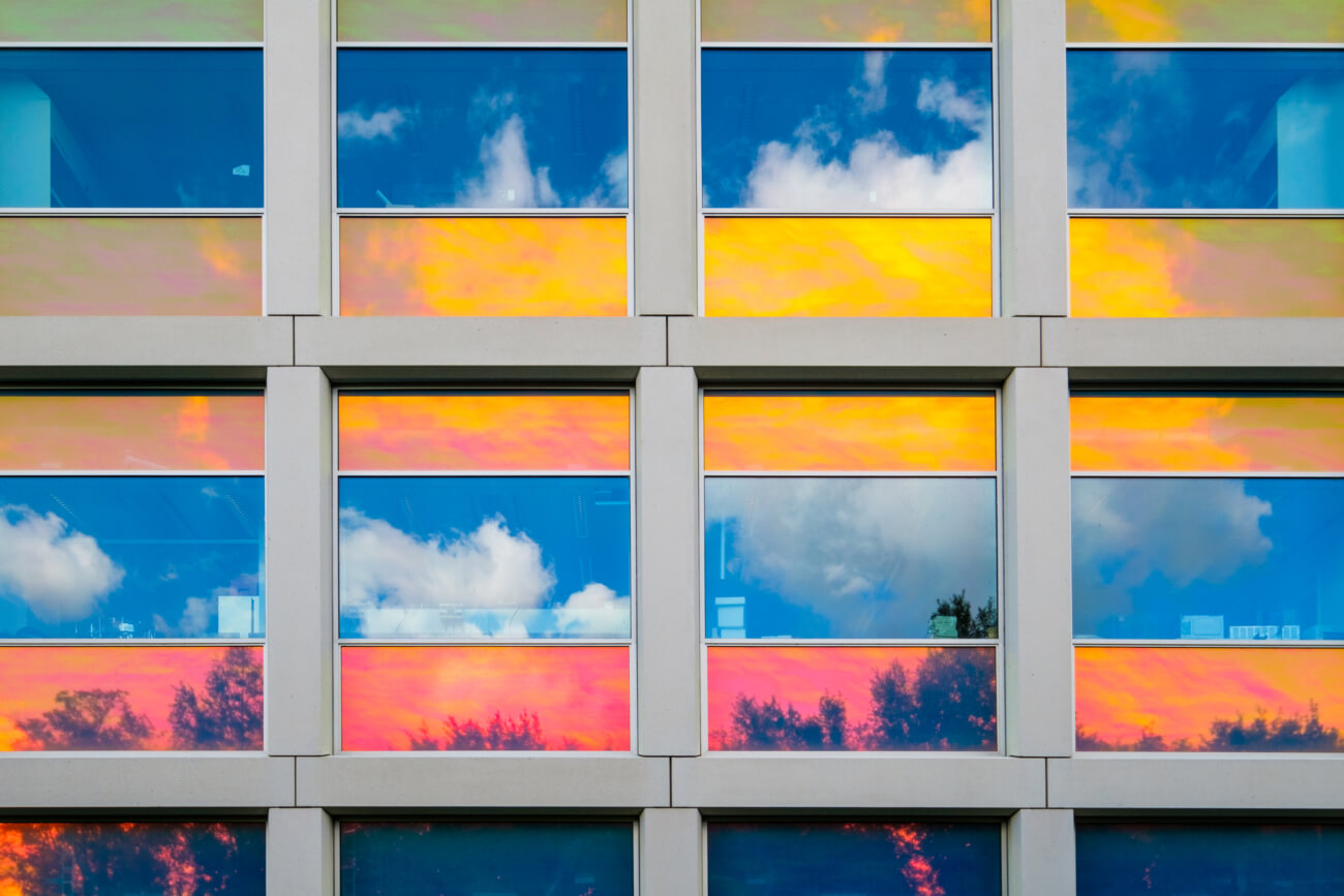 Reflections in colorful coated windows